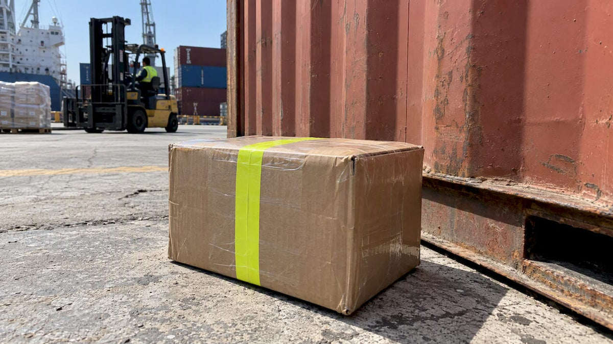 Candy parcel beside a sun-heated freight container
