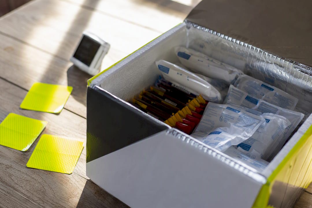 Insulated box with cold packs around chocolates