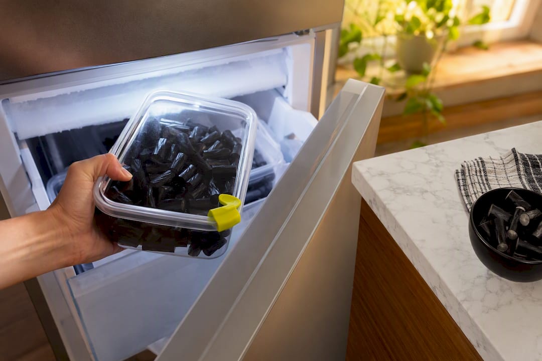Licorice stored in sealed container near freezer